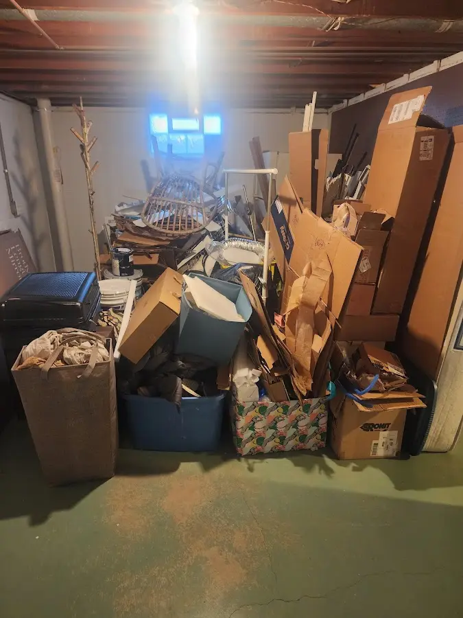 Roll-off dumpster container at job site for 2 Yard Dumpster Rental in Fort Mill